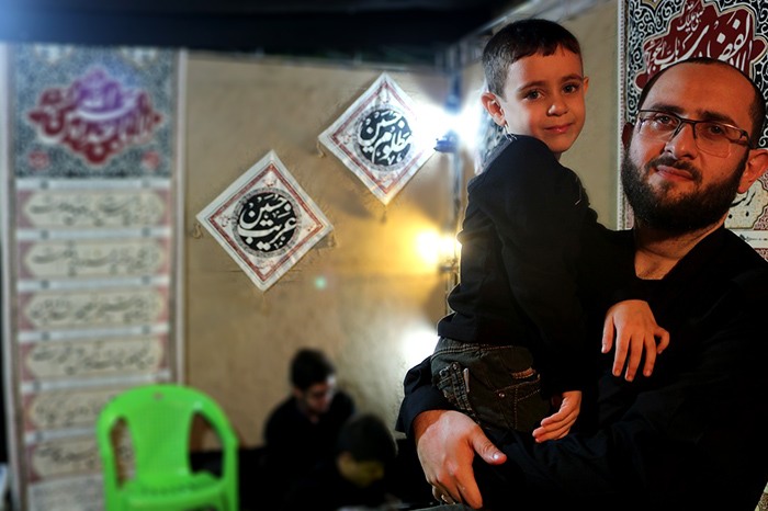 A Shiite Muslim child and father on Ashura in Tehran, Iran, Ashura 2017