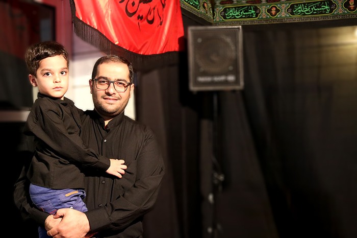 a child and his father in mourning ceremony of Ashura 2017