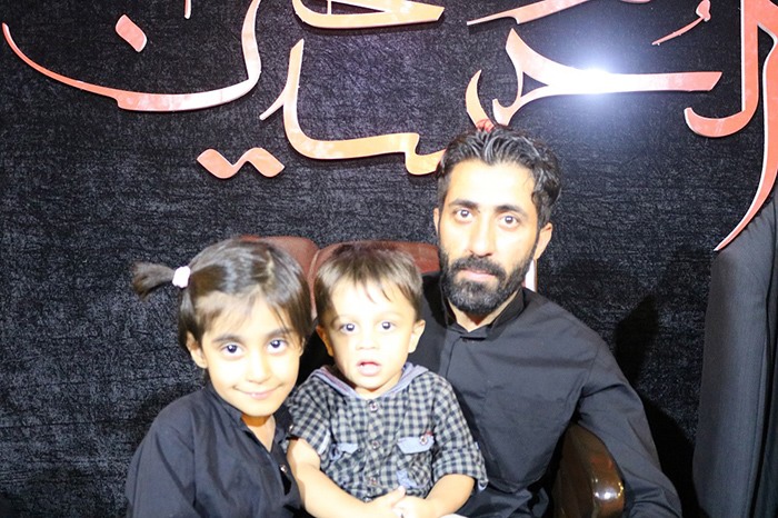 Children and their father in mourning ceremony of Ashura 2017