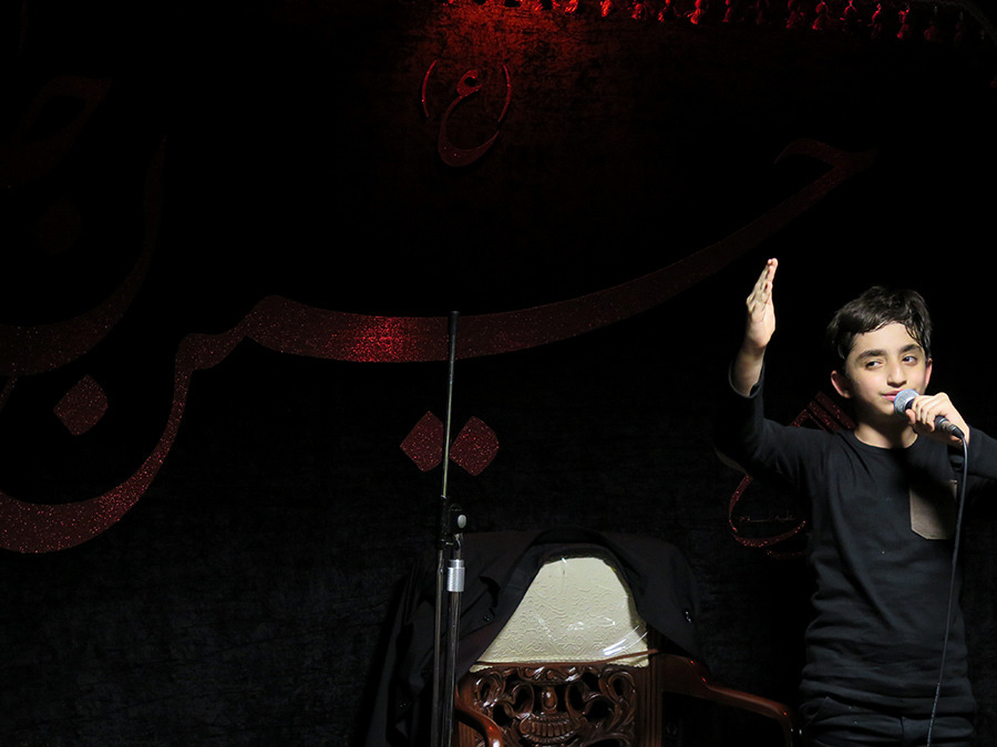 a child in Celebration of Ashura in Tehran